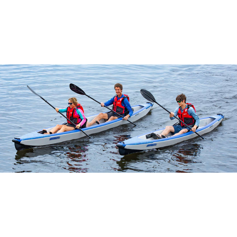 Sea Eagle RazorLite 393RL Inflatable Kayak Three people kayaking on a calm body of water.