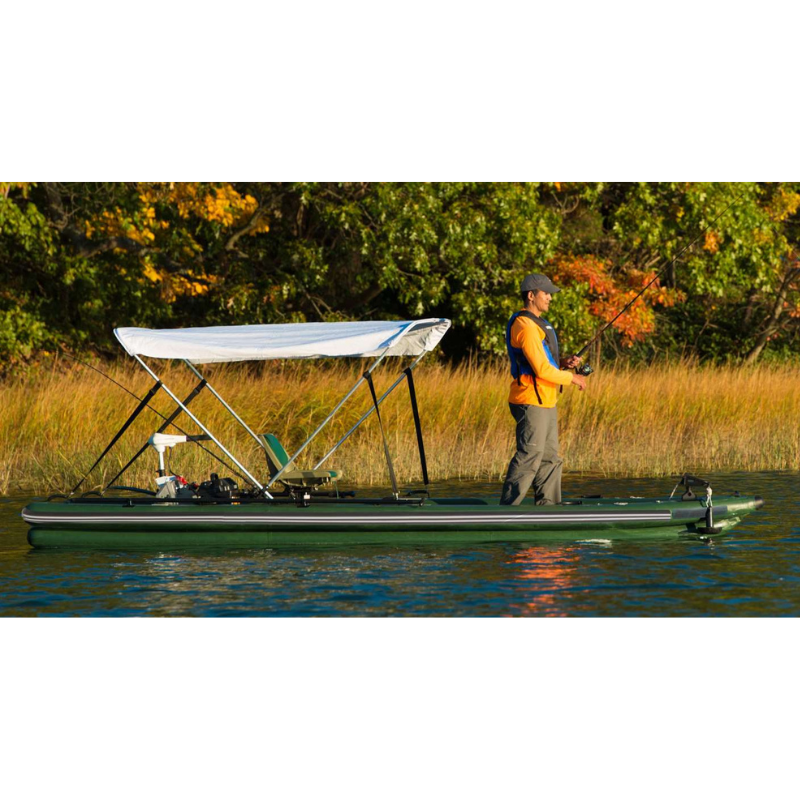 Sea Eagle FSK16 FishSkiff Inflatable Fishing Boat Man fishing on a pontoon boat on a lake with trees in the background